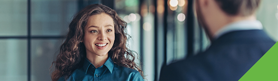 Young woman listening to young man speak