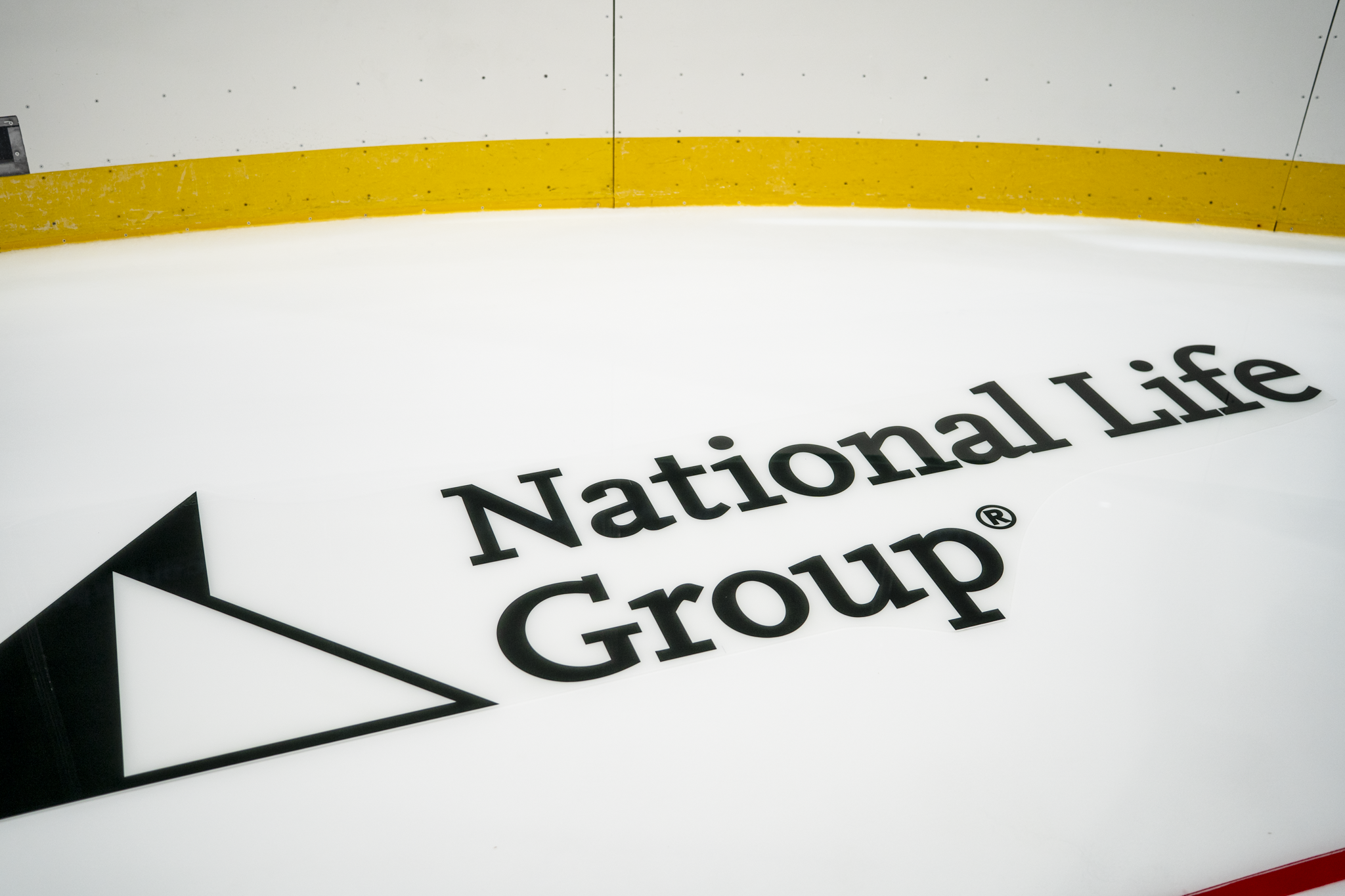 Wide view of the National Life Group logo positioned on the Dallas Stars hockey rink
