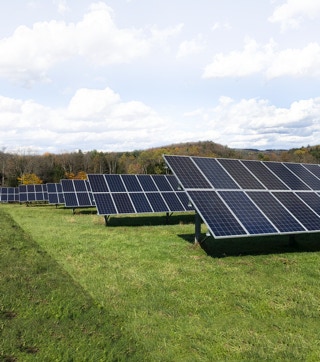 Solar panels in a field adjacent to our Vermont office help provide 15% of the office's electricity demand during summer months.